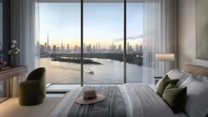 Creek Bay at Dubai Creek Harbour by Emaar Properties contemporary bedroom with floor to ceiling windows overlooking the Dubai skyline and the Gulf in Dubai Presented by Tohid Fetrat