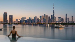 Creek Bay at Dubai Creek Harbour by Emaar Properties infinity pool overlooking Downtown Dubai skyline and the Gulf at sunset in Dubai Presented by Tohid Fetrat