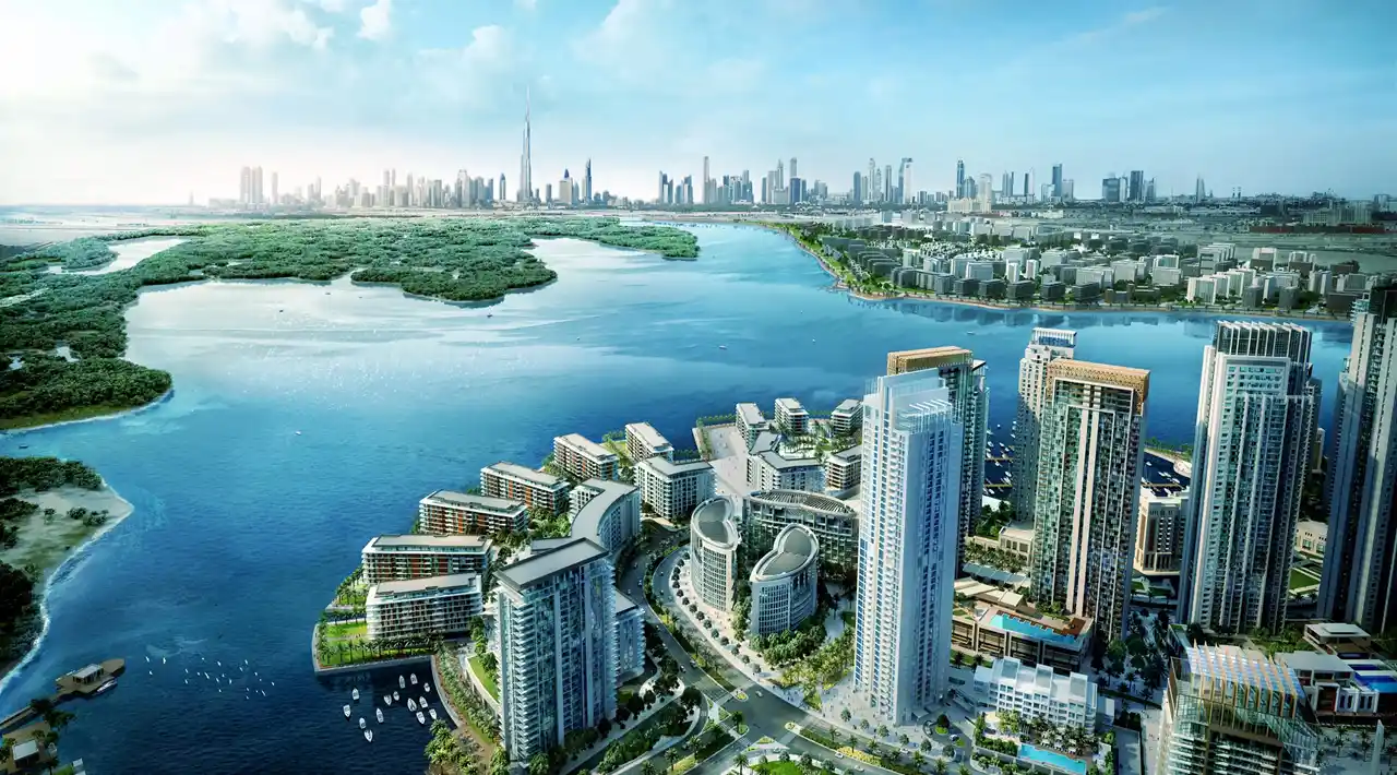 Dubai Creek Harbour Properties for Sale waterfront community view with Creek waters modern residential towers and Downtown Dubai skyline Presented by Tohid Fetrat