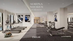 Marina Shores at Dubai Marina by Emaar Properties fitness center with cardio equipment strength training area and marina views in Dubai Presented by Tohid Fetrat