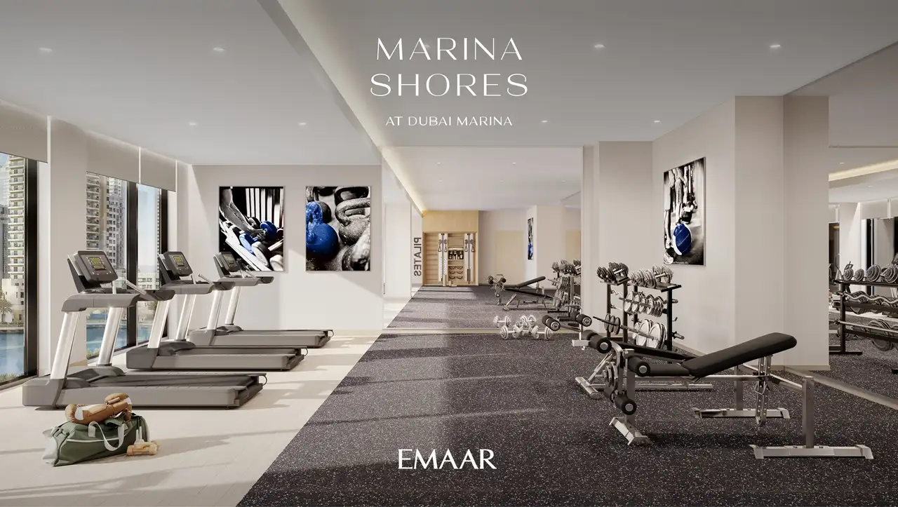 Marina Shores at Dubai Marina by Emaar Properties fitness center with cardio equipment strength training area and marina views in Dubai Presented by Tohid Fetrat