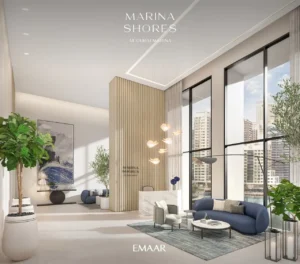 Marina Shores at Dubai Marina by Emaar Properties double height lobby interior with contemporary seating and marina views in Dubai Presented by Tohid Fetrat