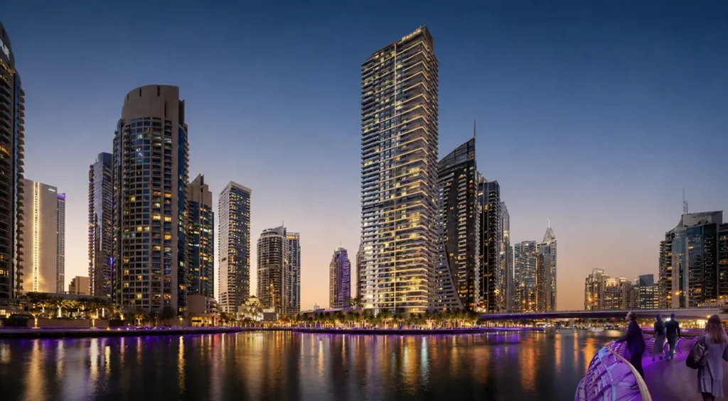 Marina Shores at Dubai Marina by Emaar Properties illuminated waterfront residential tower and marina skyline at dusk in Dubai Presented by Tohid Fetrat