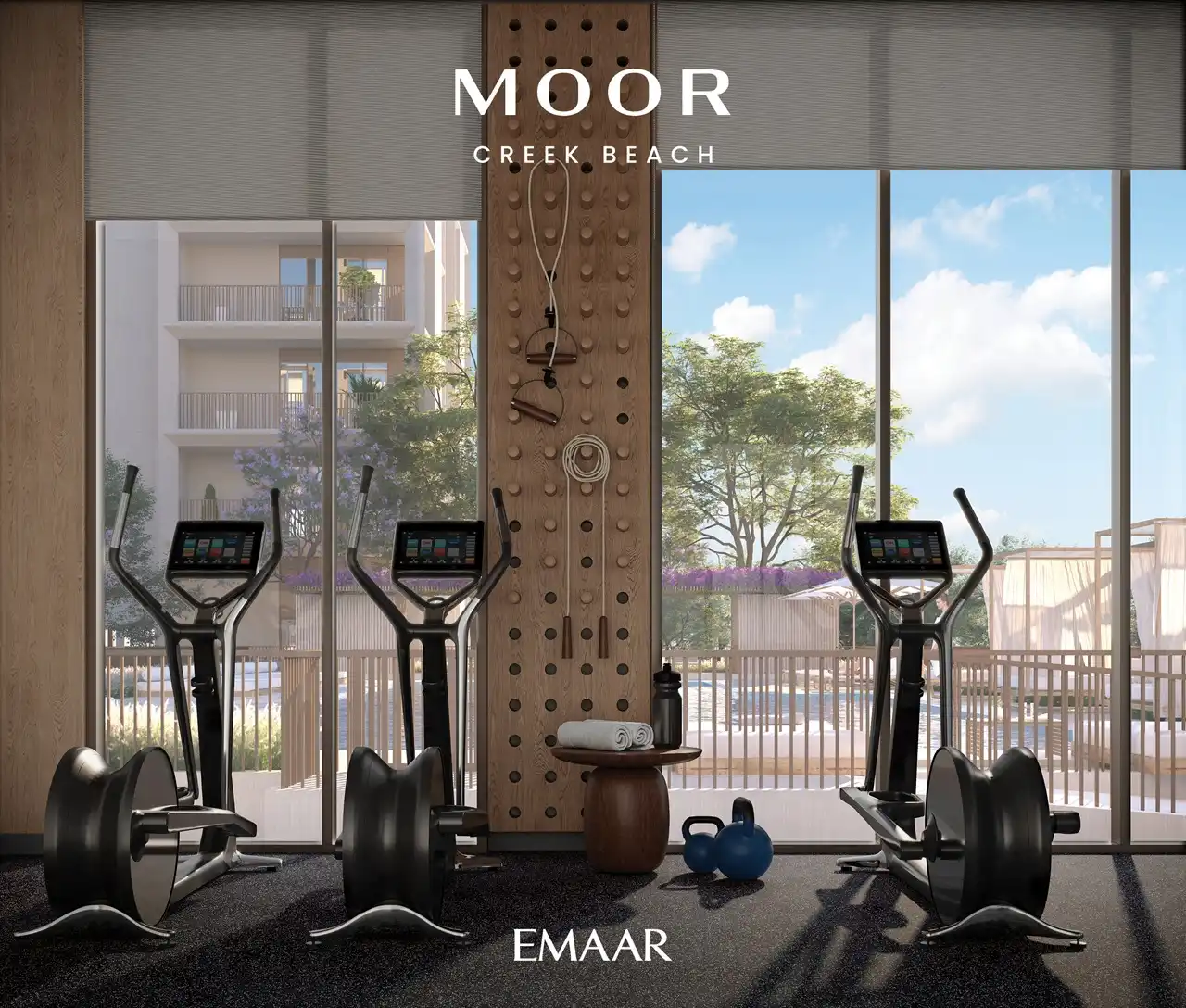 Moor at Dubai Creek Harbour by Emaar Properties modern fitness center with cardio equipment and pool views in Dubai Presented by Tohid Fetrat