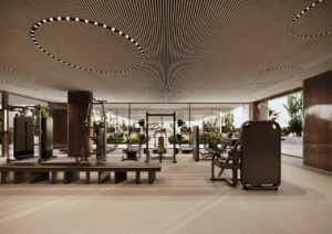 Fitness center at ORLA, Dorchester Collection, Dubai featuring state-of-the-art gym equipment, wellness facilities, personal training spaces, and luxury resident amenities. Presented by Tohid Fetrat