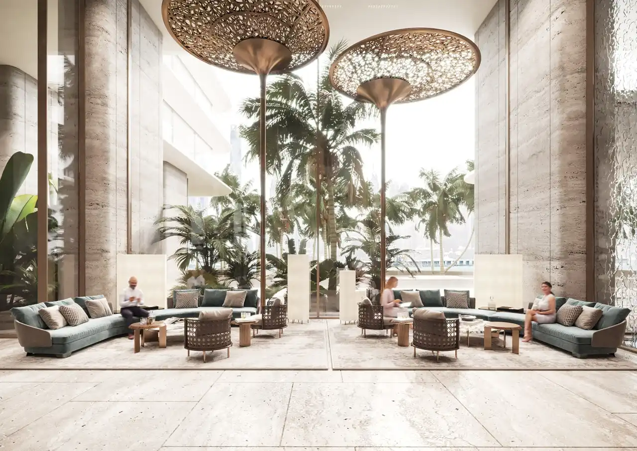 ORLA, Dorchester Collection, Dubai by OMNIYAT grand lobby featuring double height ceilings, designer lighting installations, luxury lounge seating, and landscaped views in Dubai. Presented by Tohid Fetrat