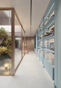 ORLA, Dorchester Collection, Dubai by OMNIYAT children's playroom featuring custom storage, toy displays, floor to ceiling glazing, and a bright family friendly environment in Dubai. Presented by Tohid Fetrat