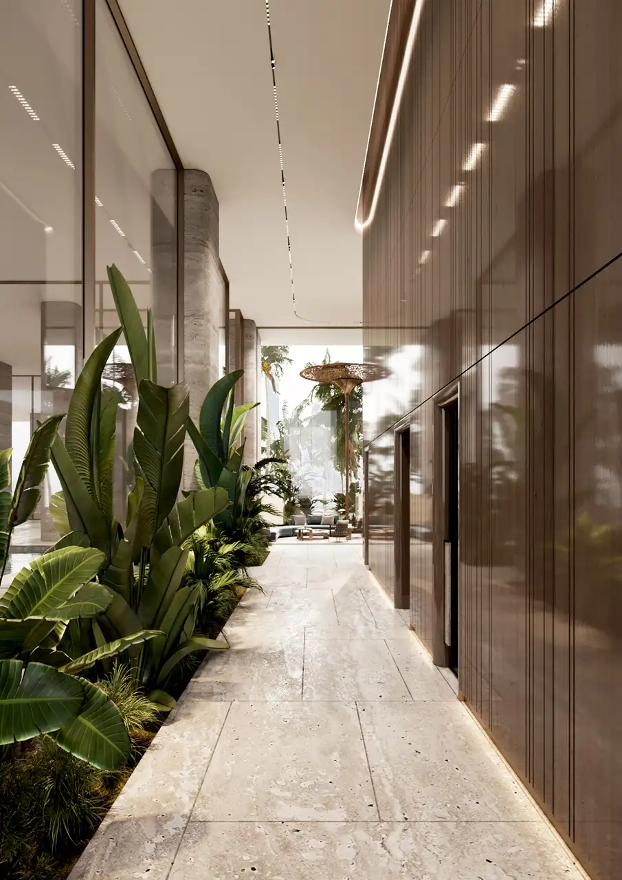 ORLA, Dorchester Collection, Dubai by OMNIYAT luxury lobby corridor featuring landscaped indoor gardens, premium finishes, natural stone flooring, and elegant architectural detailing. Presented by Tohid Fetrat