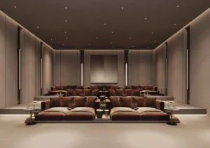 ORLA, Dorchester Collection, Dubai by OMNIYAT private cinema lounge featuring luxury reclining seating, tiered viewing arrangement, ambient lighting, and an exclusive entertainment setting in Dubai. Presented by Tohid Fetrat