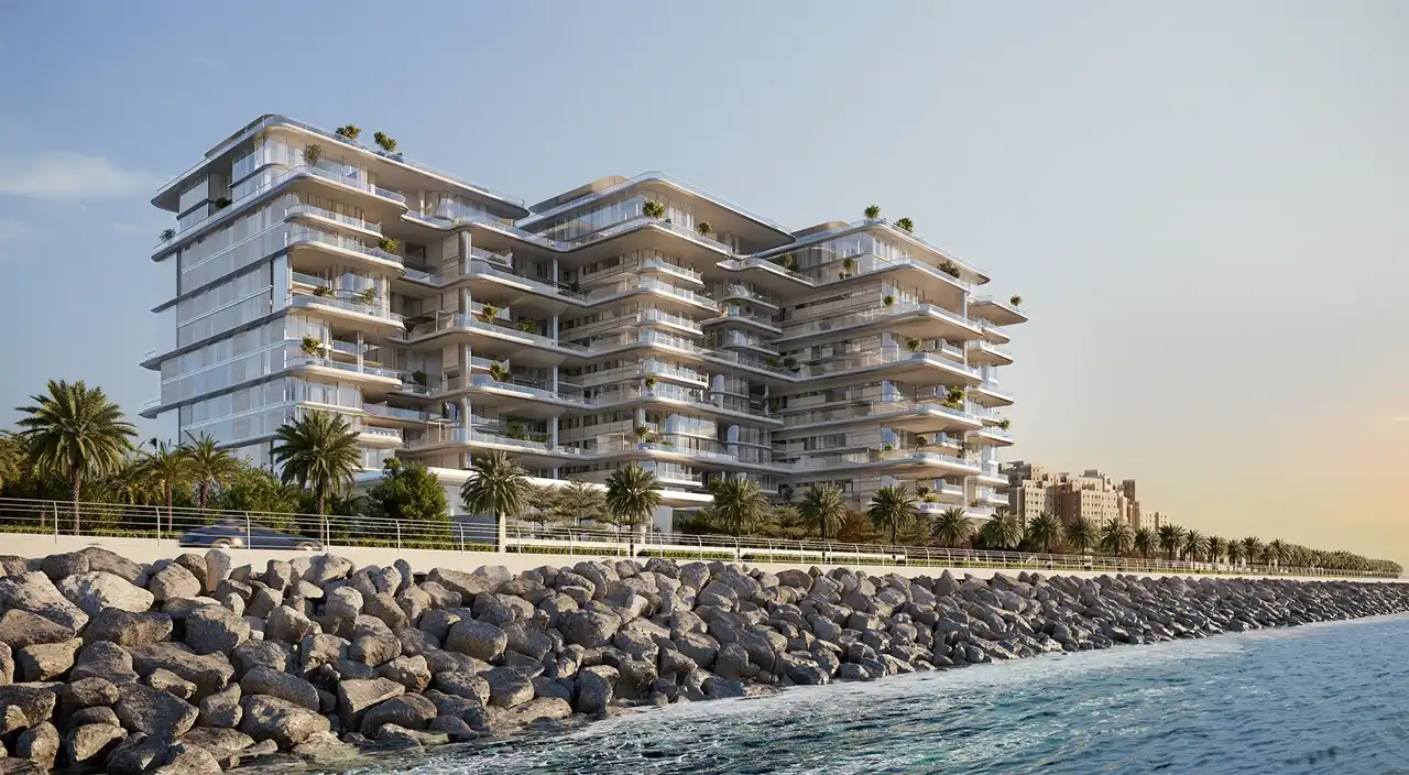 ORLA, Dorchester Collection, Dubai by OMNIYAT waterfront residences overlooking the coastline with expansive terraces, glass facades, and landscaped surroundings in Dubai. Presented by Tohid Fetrat