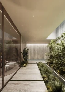 Private courtyard garden at ORLA, Dorchester Collection Dubai featuring landscaped greenery, water features, natural light, and tranquil resort-style living. Presented by Tohid Fetrat