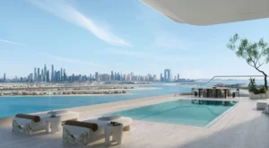 Private sky pool terrace at ORLA, Dorchester Collection Dubai overlooking Palm Jumeirah, Dubai Marina skyline, and the Gulf. Presented by Tohid Fetrat