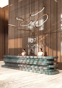Reception lobby at ORLA, Dorchester Collection, Dubai featuring concierge services, luxury interiors, branded residential hospitality, and exclusive resident arrival experience. Presented by Tohid Fetrat