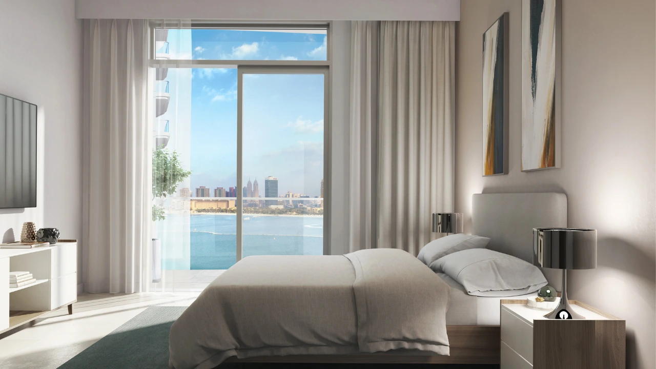 Palace by the Beach at Emaar Beachfront by Emaar luxury bedroom interior with waterfront views and floor to ceiling windows in Dubai Presented by Tohid Fetrat