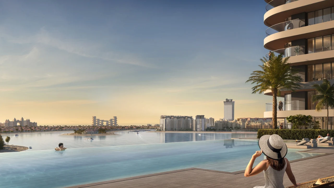 Palace by the Beach at Emaar Beachfront by Emaar infinity pool overlooking waterfront residences and the Gulf in Dubai Presented by Tohid Fetrat