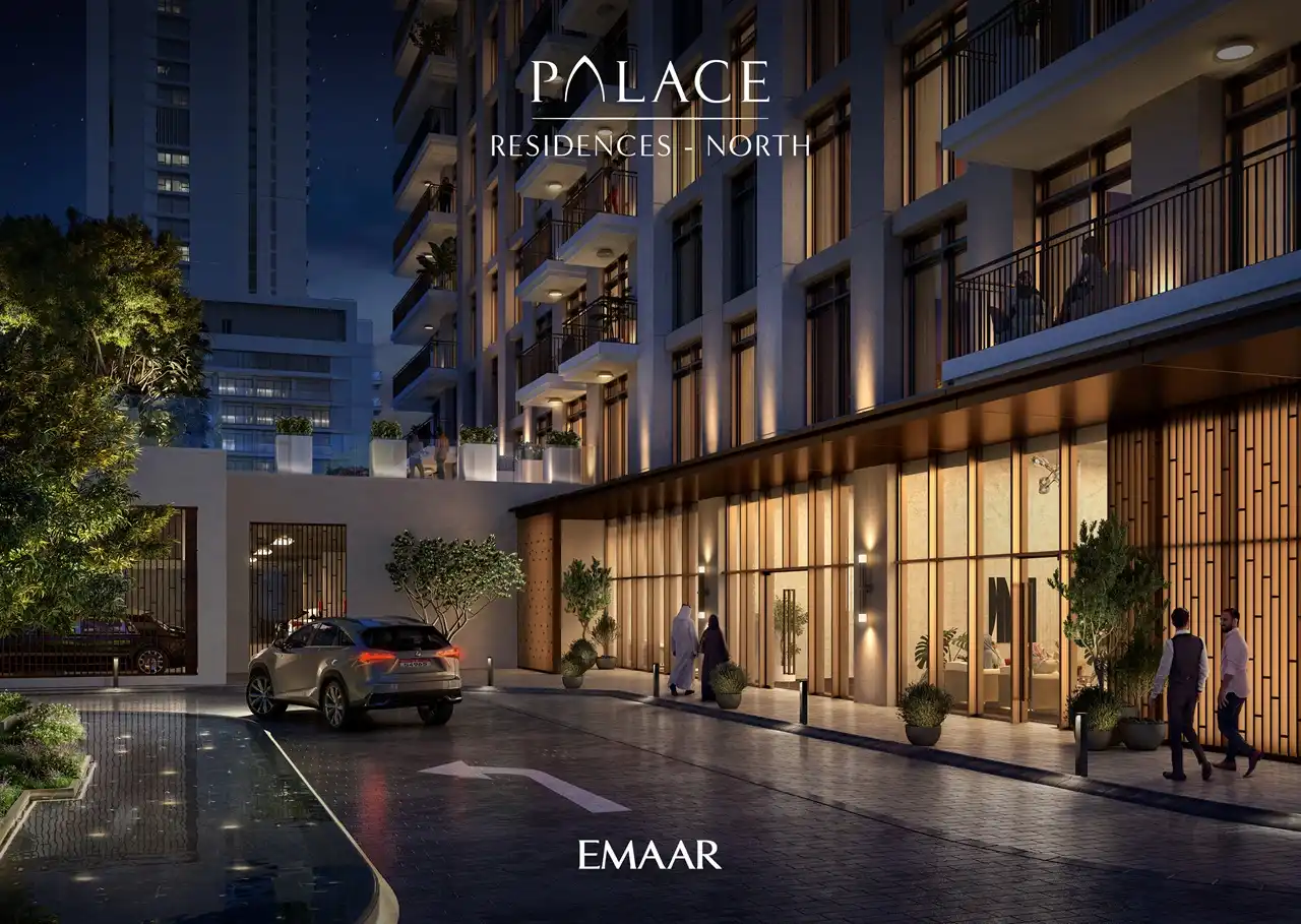 Palace Residences North at Dubai Creek Harbour by Emaar Properties illuminated residential entrance and elegant façade at night in Dubai Presented by Tohid Fetrat