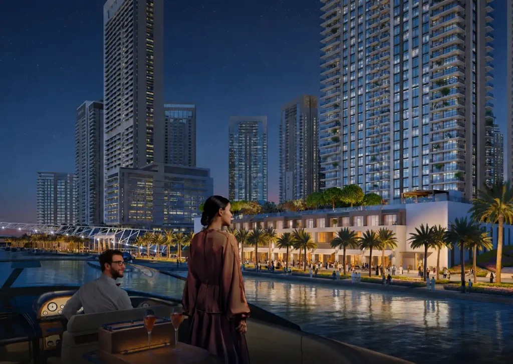 Palace Residences North at Dubai Creek Harbour by Emaar Properties luxury yacht lifestyle overlooking the illuminated marina at night in Dubai Presented by Tohid Fetrat