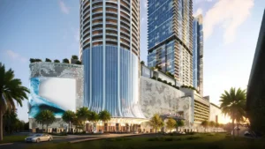 Palm Beach Tower 1 at Palm Jumeirah by Nakheel podium entrance and tower architecture with landscaped surroundings in Dubai Presented by Tohid Fetrat