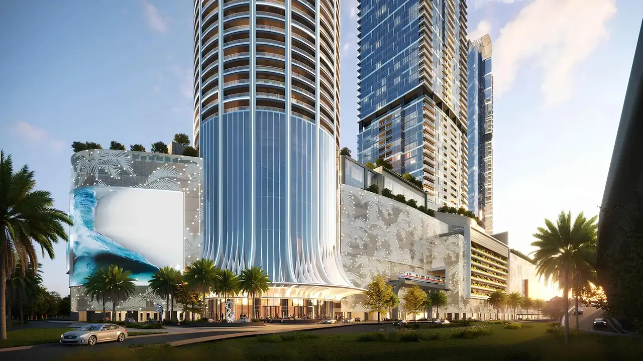Palm Beach Tower 1 at Palm Jumeirah by Nakheel podium entrance and tower architecture with landscaped surroundings in Dubai Presented by Tohid Fetrat