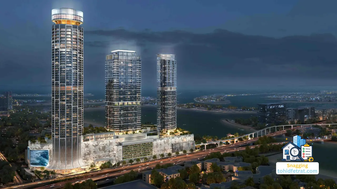 Why Snagging Matters at This Stage of Palm Beach Tower 1 featuring the illuminated waterfront towers and panoramic coastal skyline at night in Dubai Presented by Tohid Fetrat
