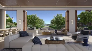 Palm Central Frond N Residences at Palm Jebel Ali by Nakheel clubhouse lounge with open plan seating, garden views and seamless indoor outdoor living spaces in Dubai - Presented by Tohid Fetrat