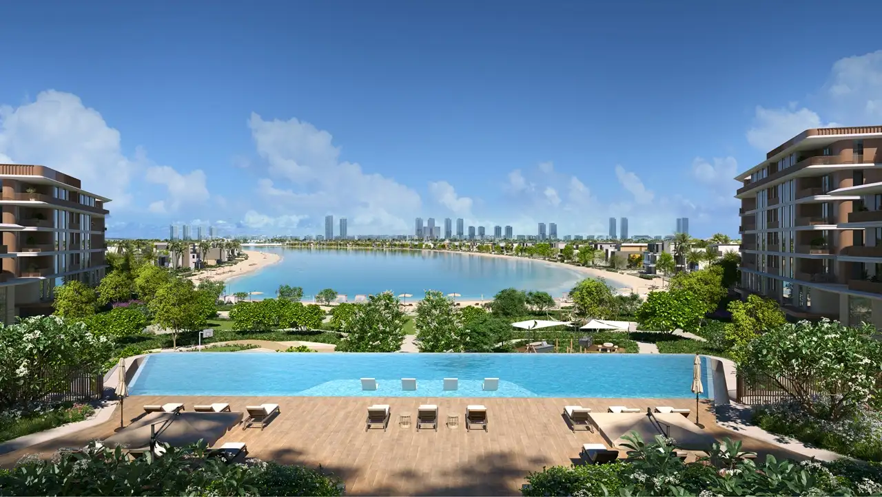 Palm Central Frond N Residences at Palm Jebel Ali by Nakheel infinity pool overlooking a waterfront lagoon with landscaped surroundings and panoramic coastal views in Dubai - Presented by Tohid Fetrat