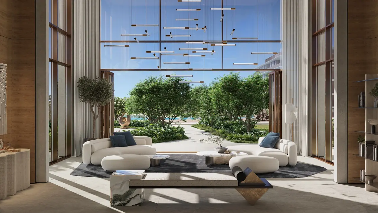 Palm Central Frond N Residences at Palm Jebel Ali by Nakheel double height lobby with designer furnishings, floor to ceiling glazing and landscaped views in Dubai - Presented by Tohid Fetrat