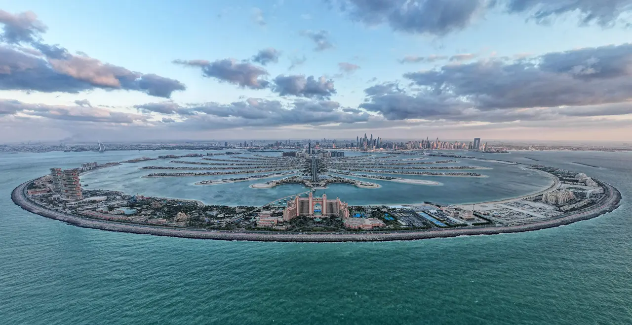 Palm Jumeirah Properties for Sale featuring luxury waterfront residences, beachfront villas, branded residences, private island living, and panoramic views across Palm Jumeirah, Dubai. Presented by Tohid Fetrat