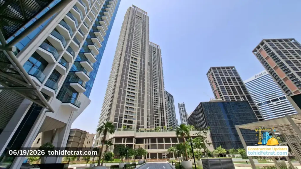 Peninsula Four The Plaza tower view in Business Bay Dubai showing completed exterior architecture and landscaped surroundings during the June 2026 construction update Captured by Tohid Fetrat