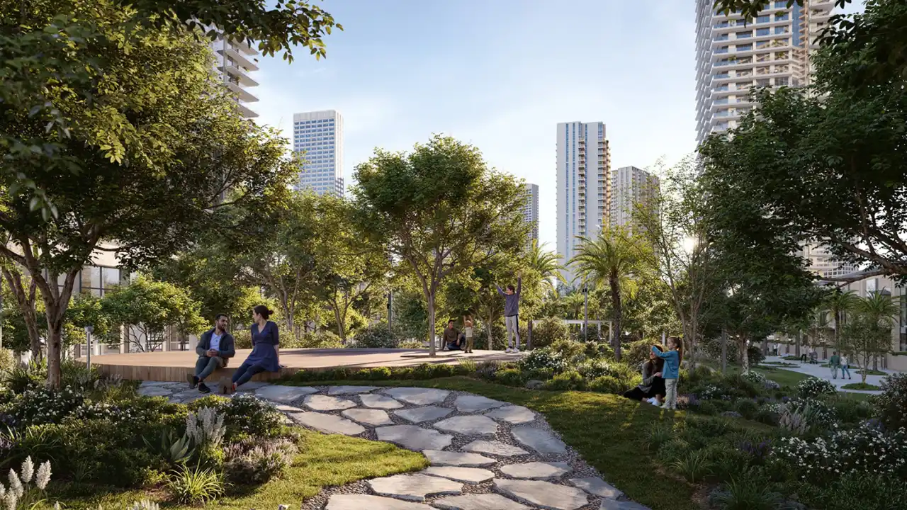 Silva at Dubai Creek Harbour by Emaar Properties landscaped community garden with walking paths shaded seating areas and residential towers in Dubai - Presented by Tohid Fetrat