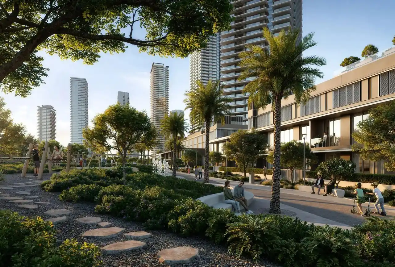 Silva at Dubai Creek Harbour by Emaar Properties landscaped promenade with palm lined walkways lush gardens residential towers and outdoor leisure spaces in Dubai - Presented by Tohid Fetrat