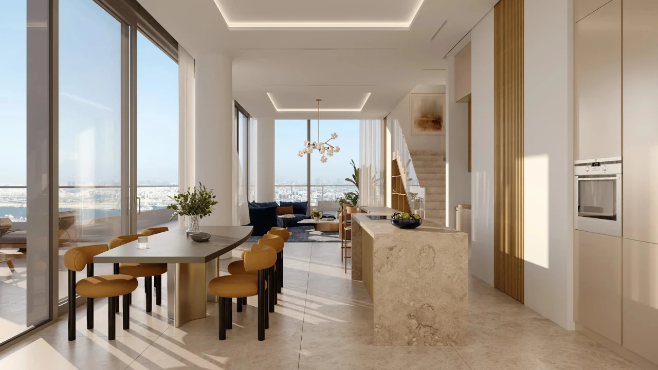 ANWA Aria by OMNIYAT contemporary kitchen and dining room with luxury finishes floor to ceiling windows and panoramic waterfront views in Dubai Presented by Tohid Fetrat