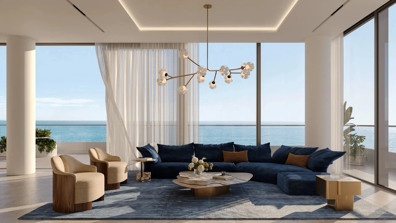 ANWA Aria by OMNIYAT luxury living room with panoramic sea views floor to ceiling windows and contemporary interior design in Dubai Presented by Tohid Fetrat