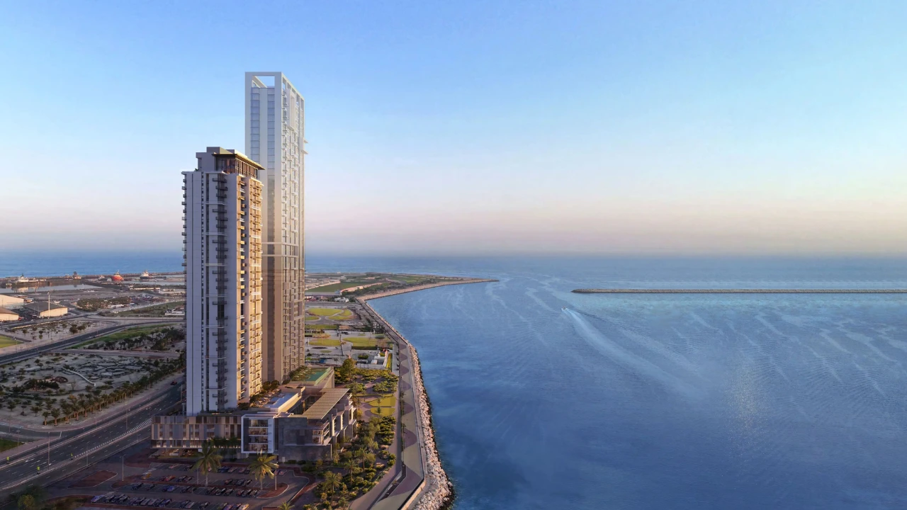 ANWA Aria by OMNIYAT waterfront residential tower overlooking the coastline and open sea with panoramic aerial views in Dubai Presented by Tohid Fetrat
