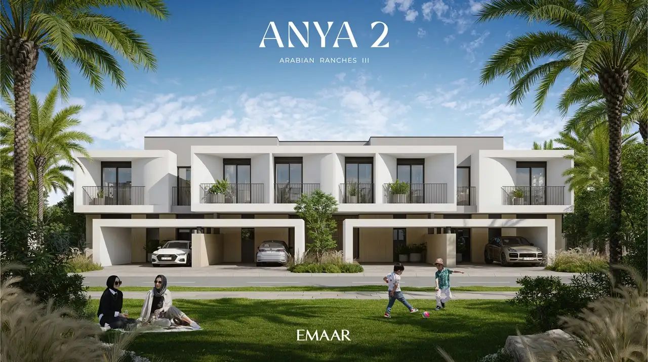 Anya 2 at Arabian Ranches 3 by Emaar Properties family townhouses overlooking landscaped green spaces with contemporary architecture and palm lined surroundings in Dubai - Presented by Tohid Fetrat