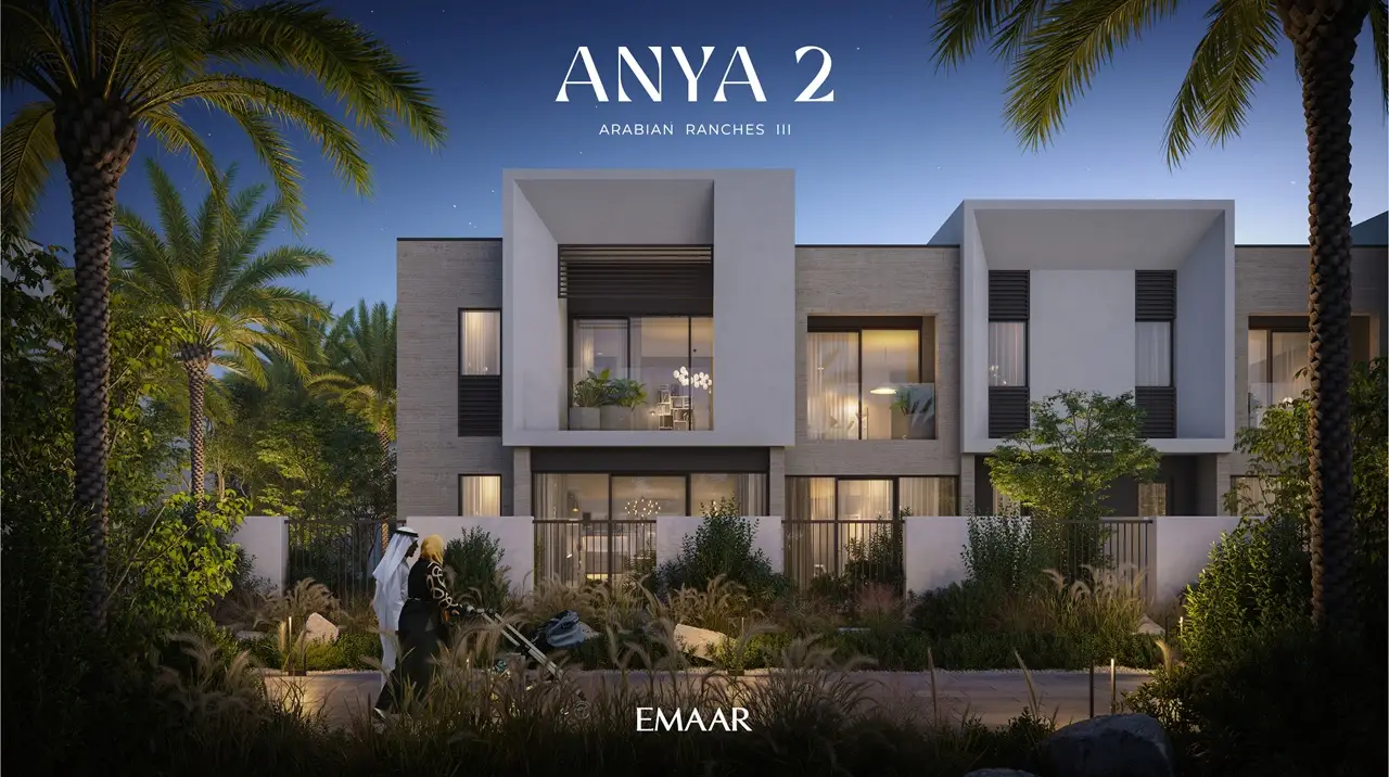 Anya 2 at Arabian Ranches 3 by Emaar Properties contemporary townhouse exterior illuminated at night with landscaped gardens, elegant architecture, and palm trees in Dubai - Presented by Tohid Fetrat