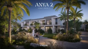 Anya 2 at Arabian Ranches 3 by Emaar Properties contemporary townhouses illuminated at night with landscaped gardens, palm trees, and pedestrian pathways in Dubai - Presented by Tohid Fetrat