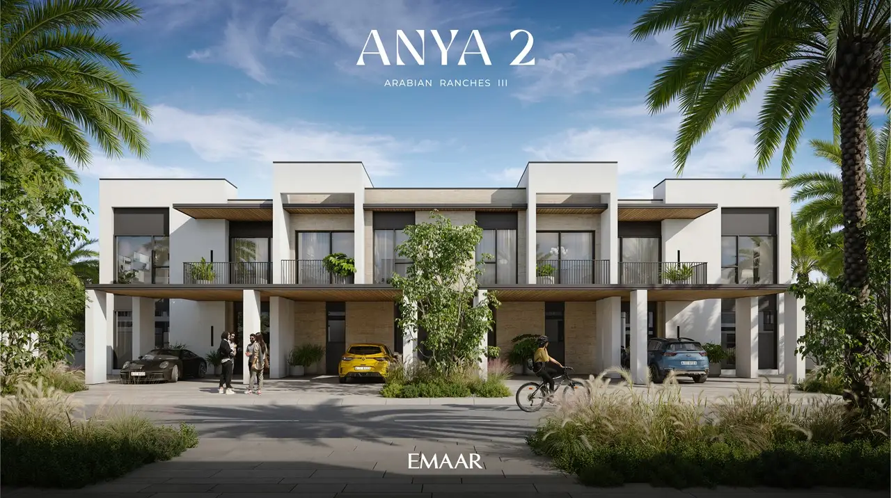 Anya 2 at Arabian Ranches 3 by Emaar Properties contemporary townhouses with landscaped streetscape, modern architecture, covered parking, and palm trees in Dubai - Presented by Tohid Fetrat