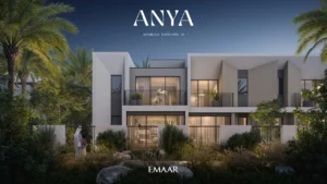 Anya at Arabian Ranches 3 by Emaar Properties contemporary townhouse evening facade with illuminated interiors and landscaped gardens in Dubai Presented by Tohid Fetrat