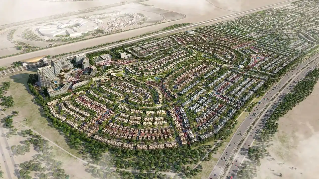 Aerial master plan view of Arabian Ranches 3 showcasing residential neighborhoods, landscaped parks, road network, and community amenities in Dubai. Presented by Tohid Fetrat