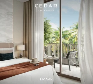 Cedar at Dubai Creek Harbour by Emaar Properties contemporary bedroom with private balcony overlooking landscaped greenery in Dubai - Presented by Tohid Fetrat
