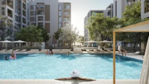 Cedar at Dubai Creek Harbour by Emaar Properties outdoor swimming pool surrounded by landscaped gardens and residential buildings in Dubai - Presented by Tohid Fetrat