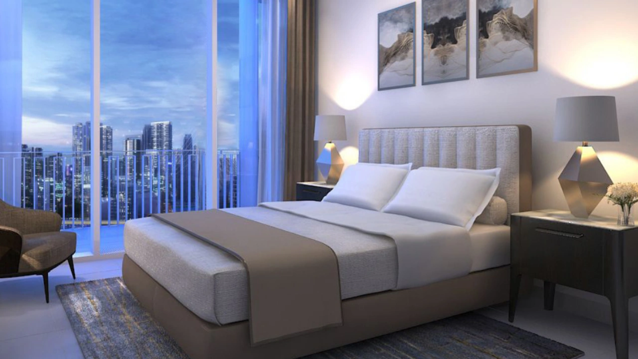 Creek Gate at Dubai Creek Harbour by Emaar Properties contemporary master bedroom with floor to ceiling windows and skyline view in Dubai - Presented by Tohid Fetrat