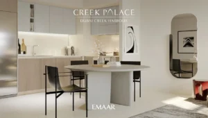 Creek Palace at Dubai Creek Harbour by Emaar Properties modern kitchen and dining interior with round table, neutral finishes, and elegant decor in Dubai Presented by Tohid Fetrat