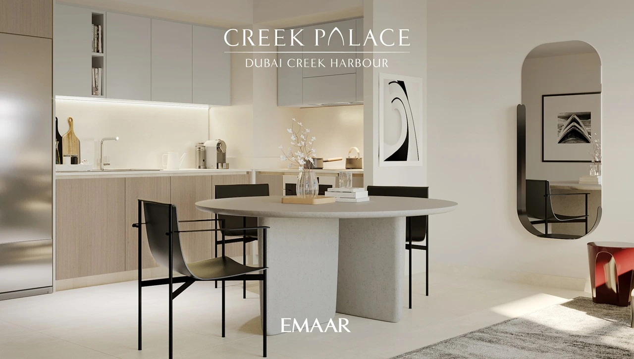 Creek Palace at Dubai Creek Harbour by Emaar Properties modern kitchen and dining interior with round table, neutral finishes, and elegant decor in Dubai Presented by Tohid Fetrat