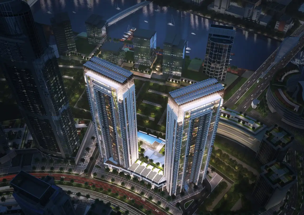 Creekside 18 at Dubai Creek Harbour by Emaar Properties aerial view of the twin residential towers and landscaped podium beside the waterfront. Presented by Tohid Fetrat.