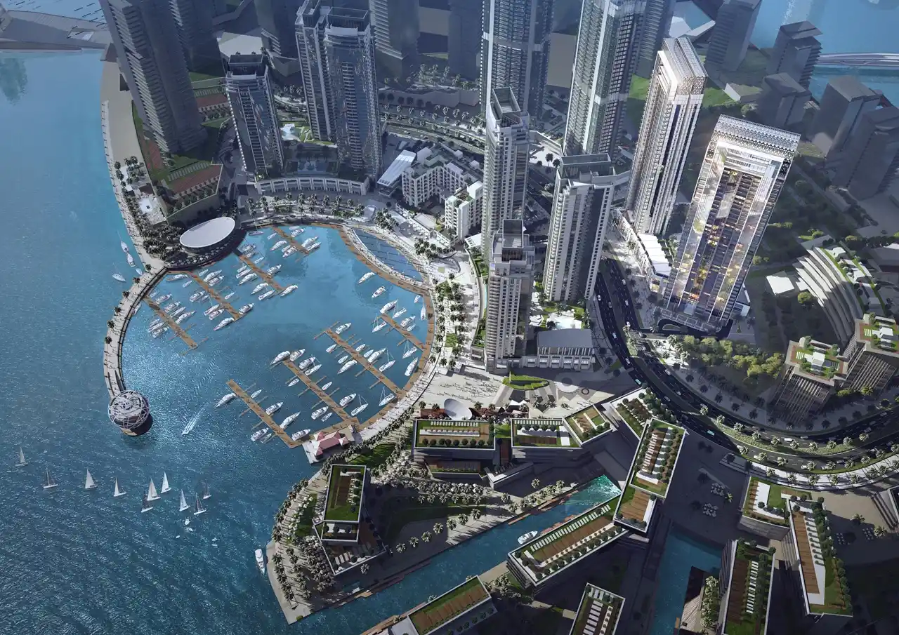 Creekside 18 at Dubai Creek Harbour by Emaar Properties aerial view overlooking the marina waterfront and the surrounding Dubai skyline. Presented by Tohid Fetrat.