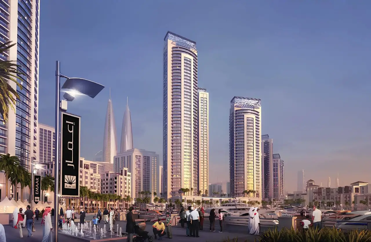 Dubai Creek Residences at Dubai Creek Harbour by Emaar Properties marina promenade with residential towers, yachts, waterfront boulevard, and Dubai skyline in Dubai Presented by Tohid Fetrat