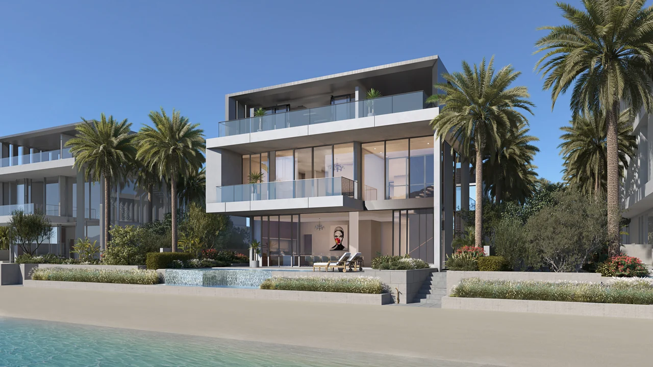 Frond A by Nakheel in Palm Jebel Ali Baia Luna villa exterior seen from the beach with terrace pool layered balconies and mature palm planting in Dubai - Presented by Tohid Fetrat