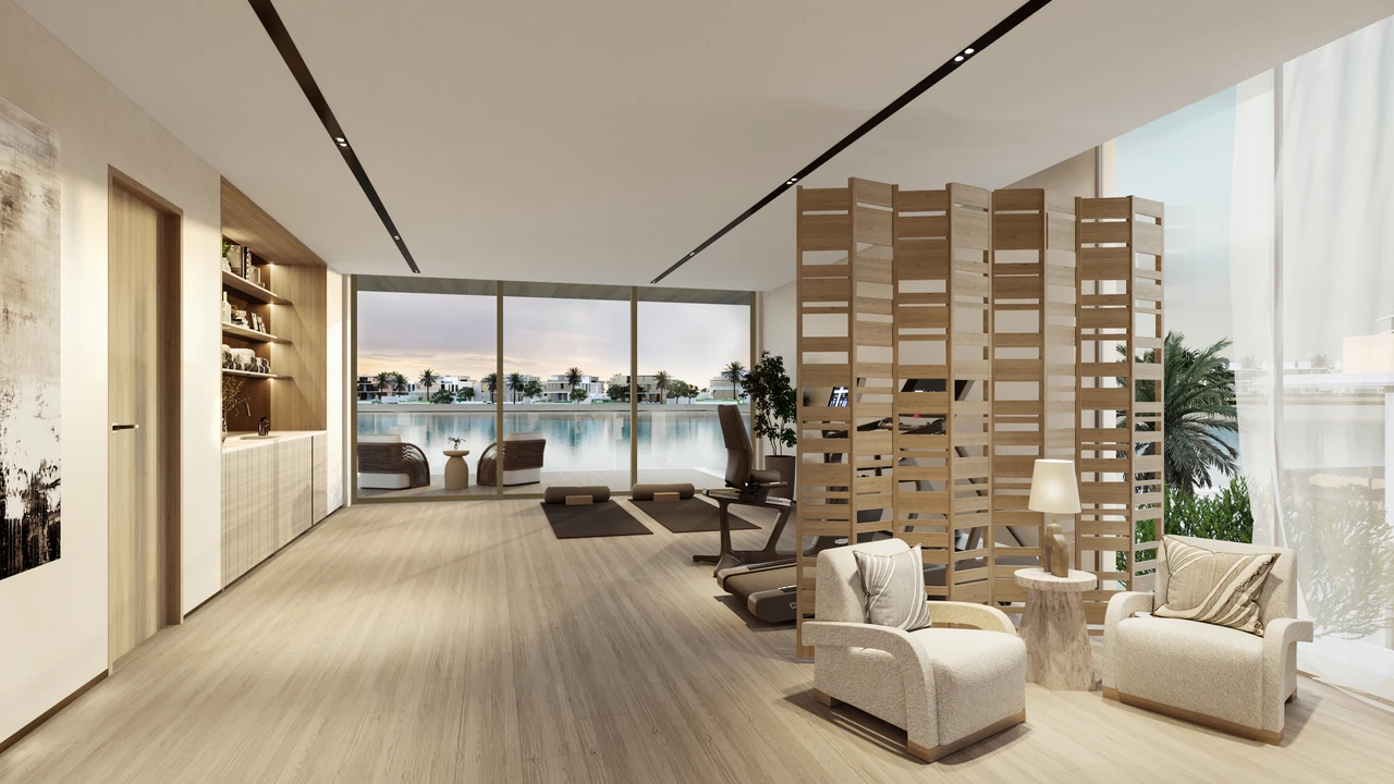 Frond A by Nakheel in Palm Jebel Ali Wave Crest villa lounge with timber slatted screen study area and waterfront view at sunset in Dubai - Presented by Tohid Fetrat